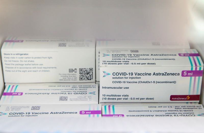 Boxes of AstraZeneca COVID-19 vaccine is seen in a fridge