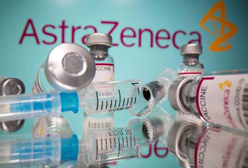 Vials labelled “AstraZeneca COVID-19 Coronavirus Vaccine” and a broken syringe