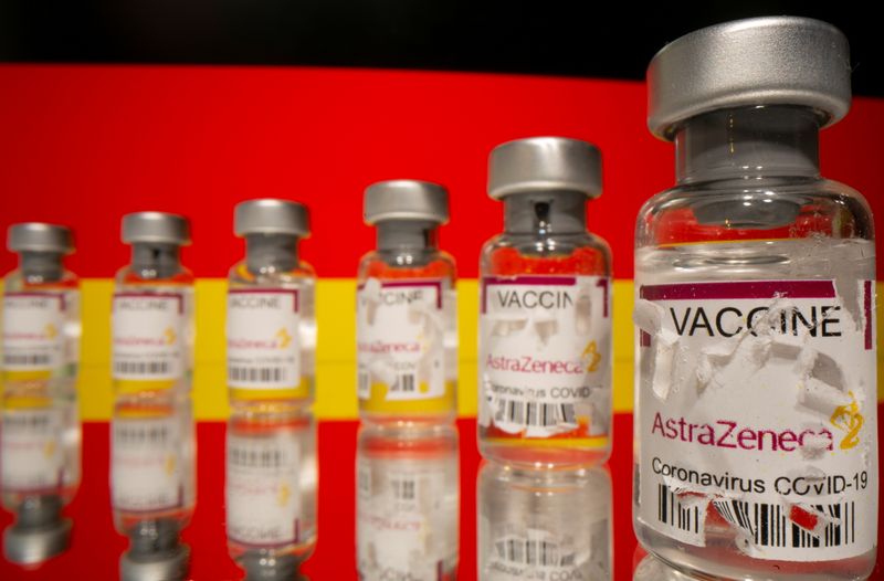 Vials labelled with partially torn sticker “AstraZeneca COVID-19 Coronavirus Vaccine”