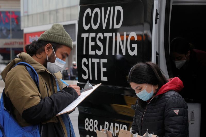 A man signs up to take a coronavirus disease (COVID-19)