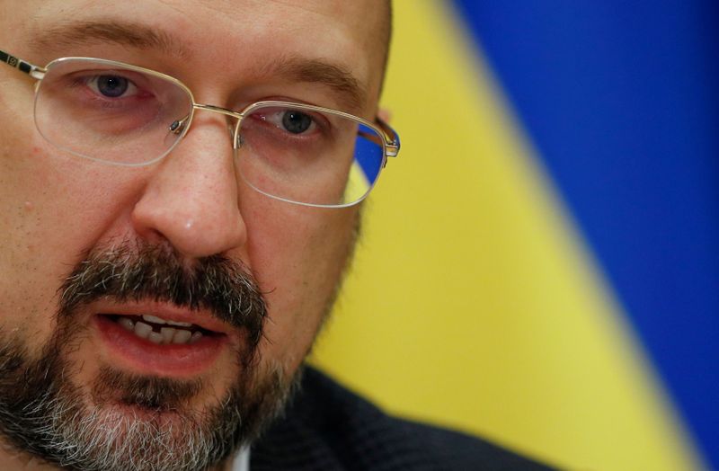 FILE PHOTO: Ukraine’s Prime Minister Shmygal speaks during an interview