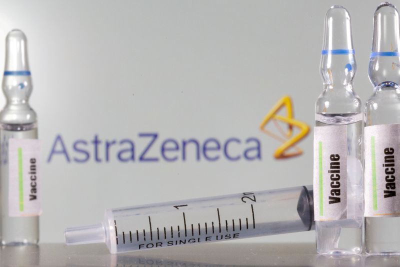 FILE PHOTO: A test tube labelled ‘vaccine’ is seen in