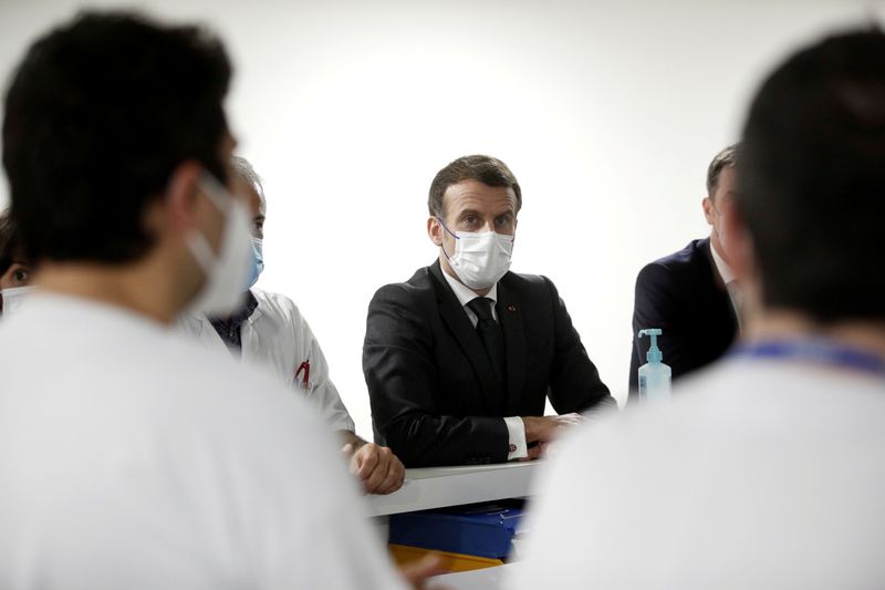 FILE PHOTO: French President Macron visits the ICU unit for