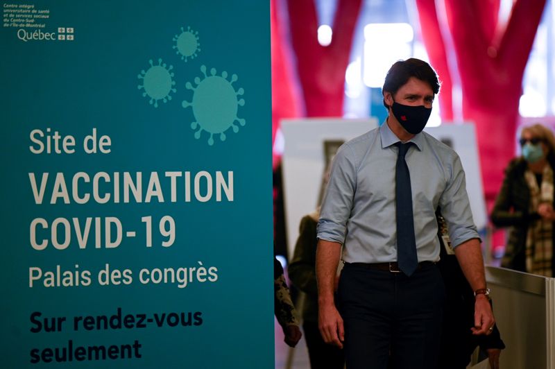 FILE PHOTO: Canada’s Prime Minister Trudeau visits a vaccination clinic