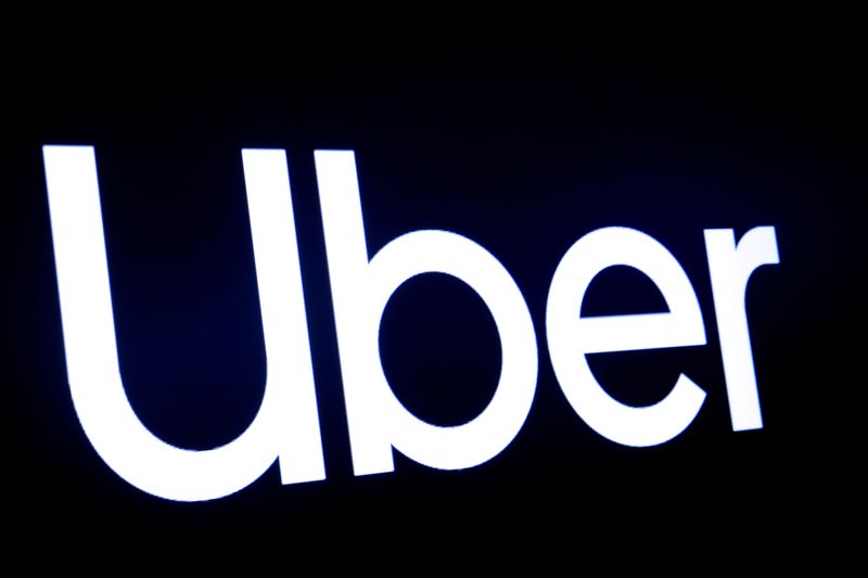 FILE PHOTO: A screen displays the company logo for Uber