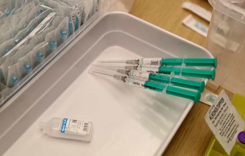 FILE PHOTO: Syringes containing Pfizer-BioNTech vaccine are seen at the