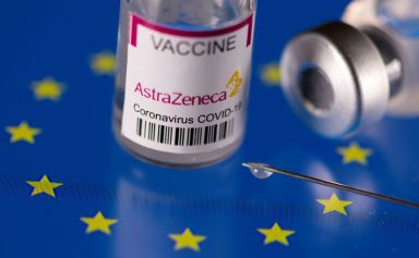 FILE PHOTO: Vials labelled “AstraZeneca coronavirus disease (COVID-19) vaccine” placed