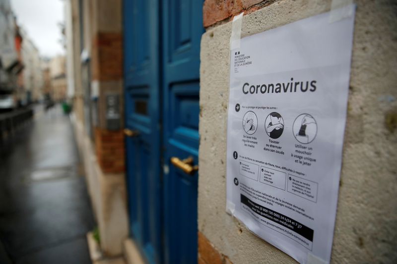 FILE PHOTO: A placard with information about the coronavirus is