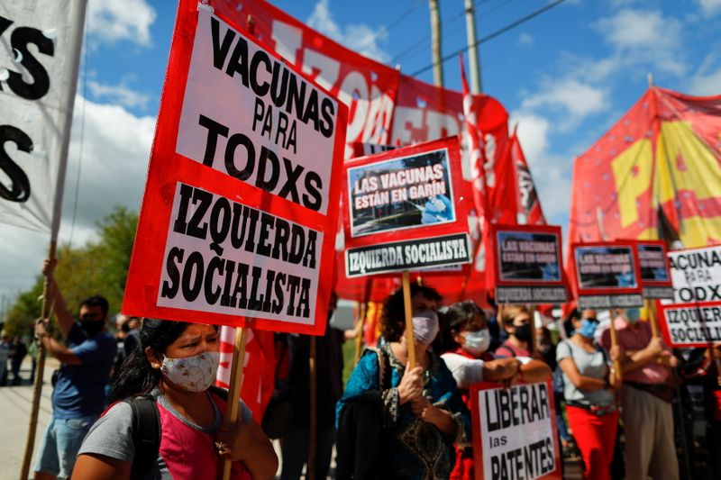 Leftist groups protest outside the mAbxience laboratory to demand its