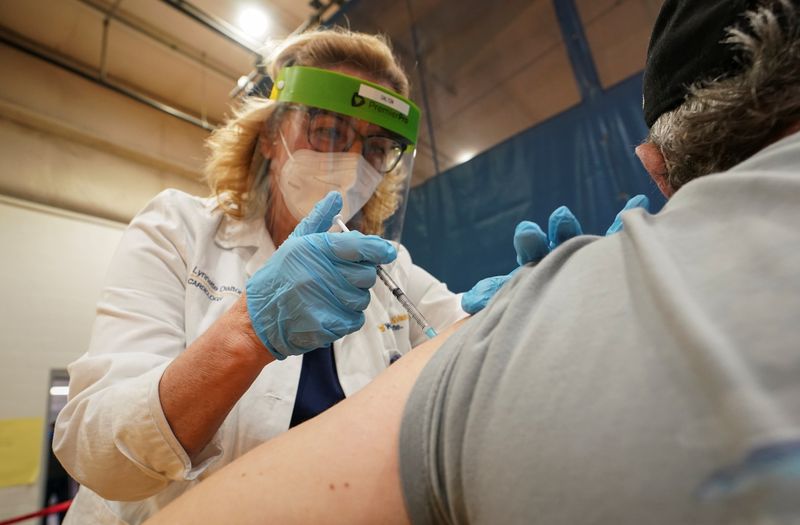 FILE PHOTO: COVID-19 vaccines are administered in Martinsburg, West Virginia