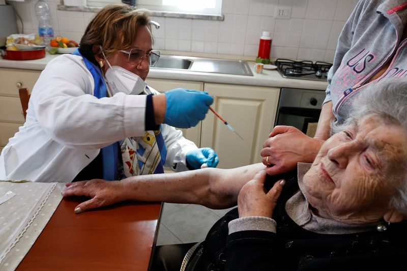 Residents receive COVID-19 vaccine at a care home in Naples