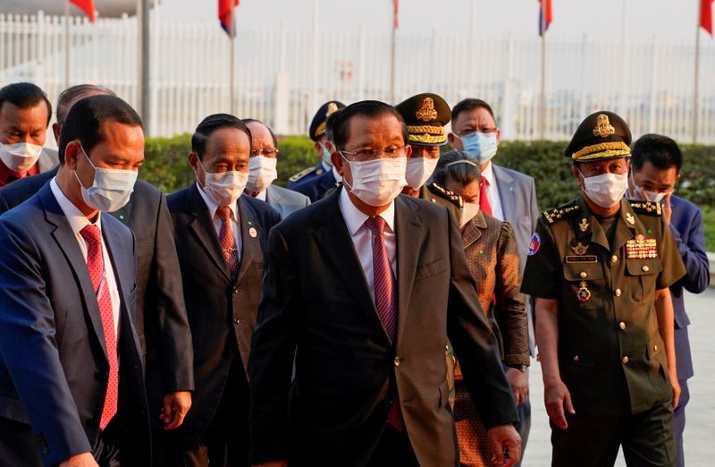 FILE PHOTO: Cambodian PM Hun Sen arrives to receive a