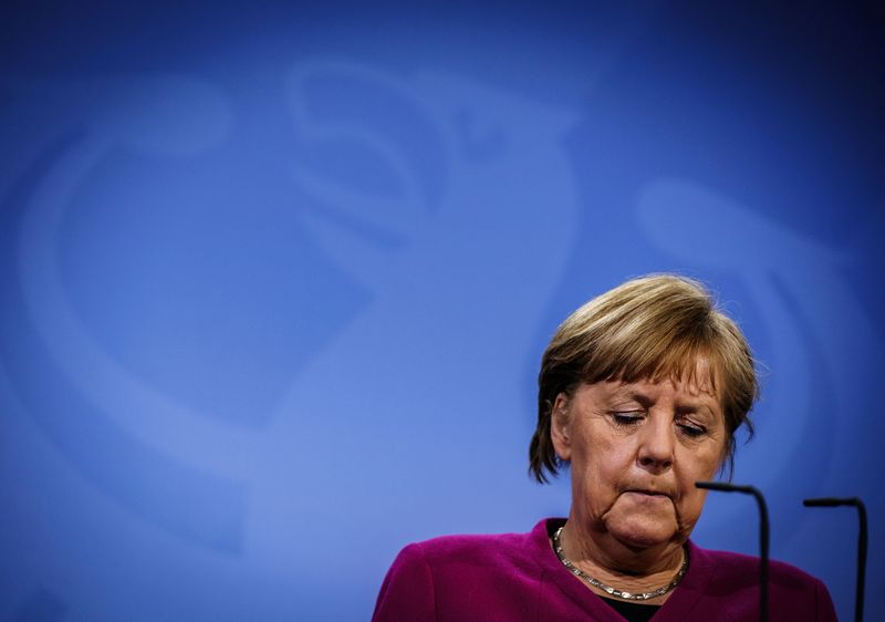German Chancellor Angela Merkel gives a statement after video conference