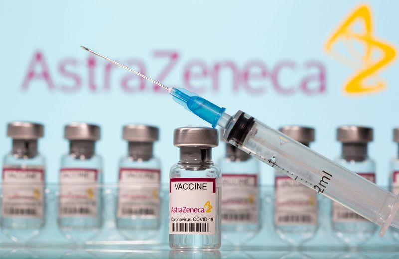 FILE PHOTO: Vials labelled “AstraZeneca COVID-19 Coronavirus Vaccine” and a