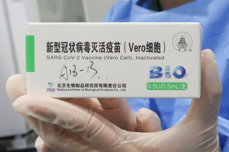 A nurse holds a box of the coronavirus disease (COVID-19)