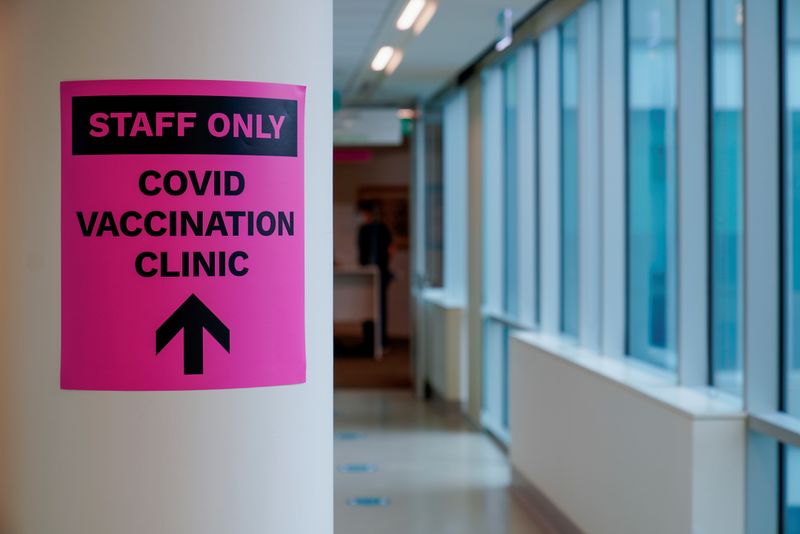 FILE PHOTO: A sign for a COVID-19 vaccination clinic is