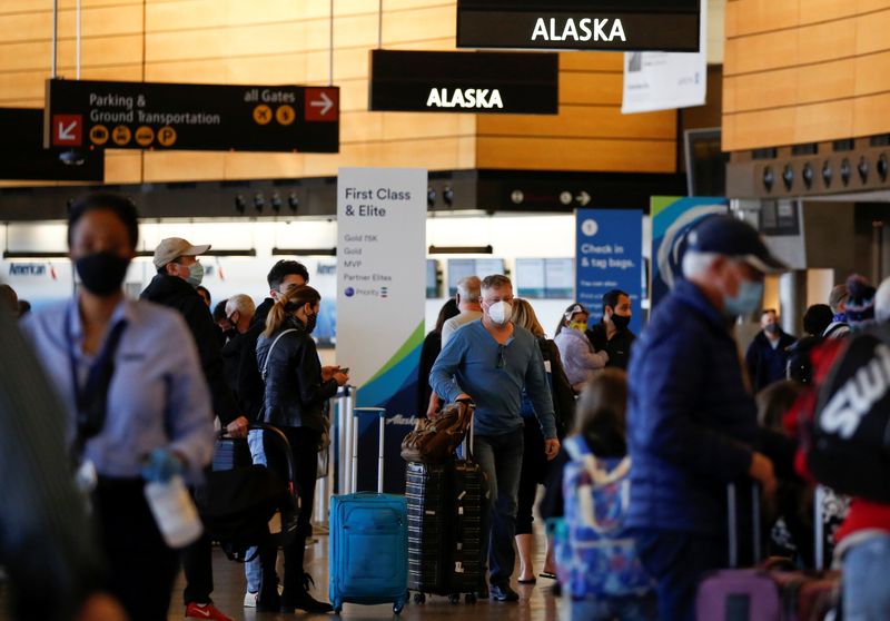 Travelers at Seattle-Tacoma International Airport in SeaTac