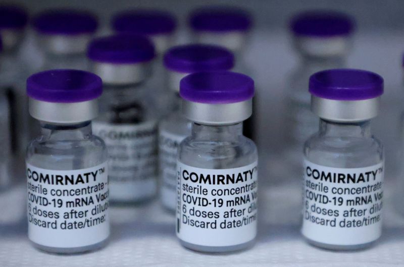FILE PHOTO: Injections with doses of the Pfizer-BioNTech Comirnaty coronavirus