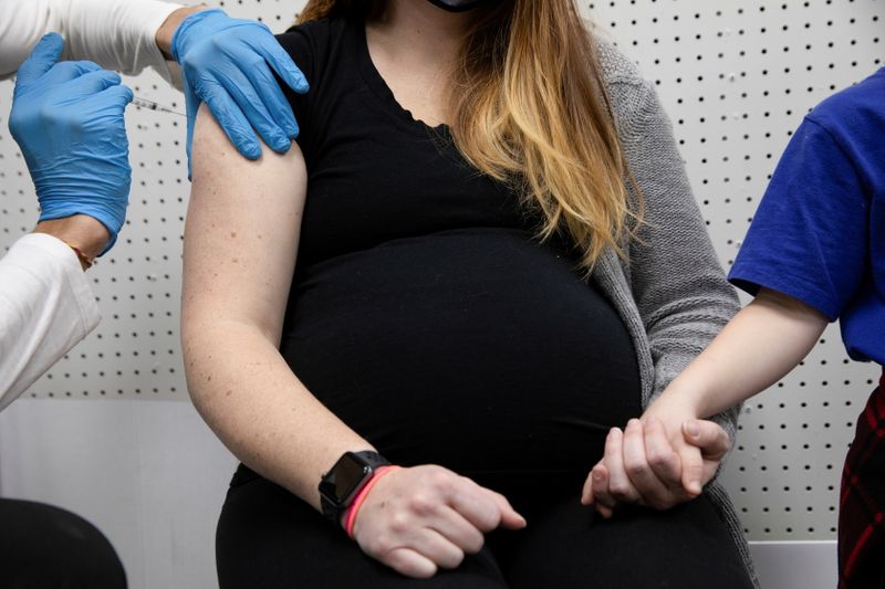 Pregnant women receive the COVID-19 vaccine in Schwenksville, Pennsylvania