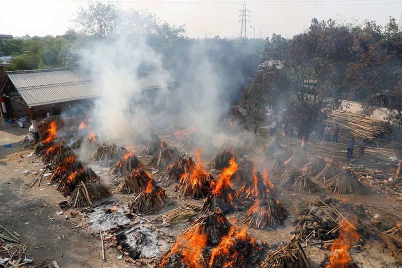 FILE PHOTO: Mass cremation of those who died from COVID-19,