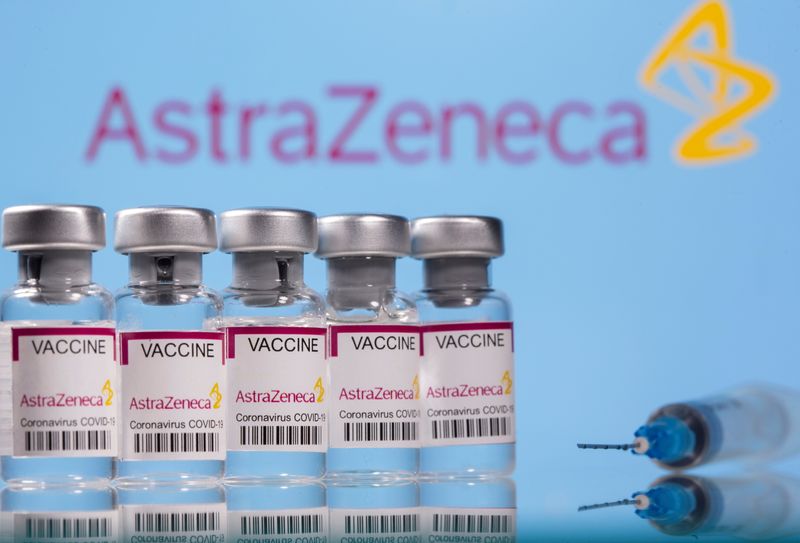 Vials labelled “Astra Zeneca COVID-19 Coronavirus Vaccine” and a syringe