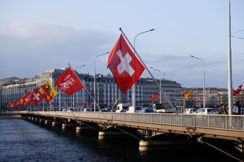 FILE PHOTO: Swiss flag on the Mont-Blanc bridge, in Geneva