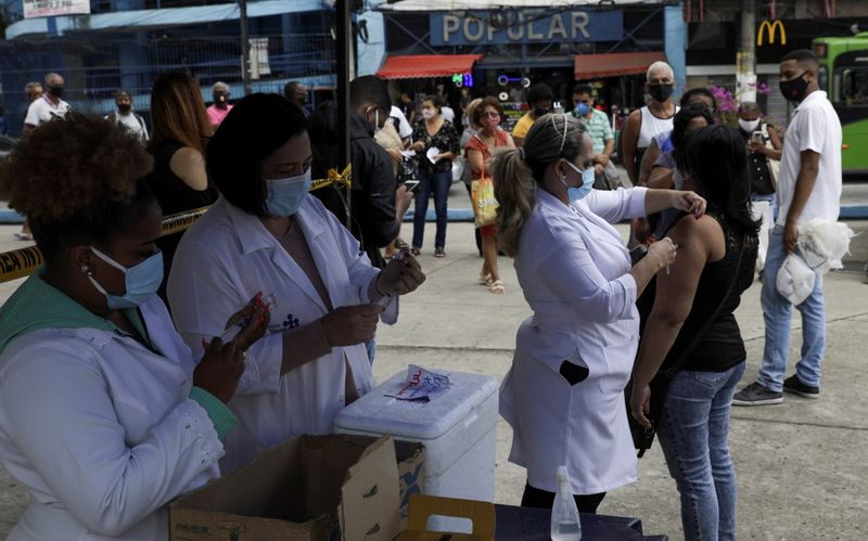 FILE PHOTO: COVID-19 vaccinations in Duque de Caxias, near Rio