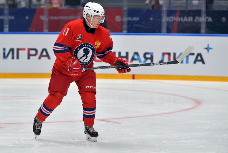 Russian President Putin plays ice hockey in Sochi
