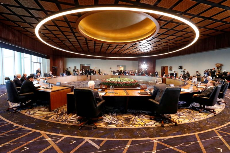 FILE PHOTO: Leaders attend the retreat session of the APEC