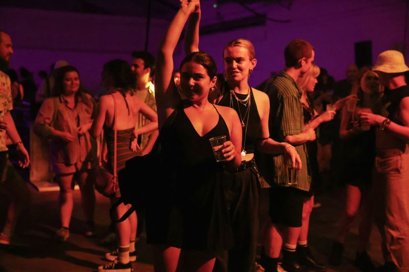 Revellers dance during the “00:01” event organised by Egyptian Elbows