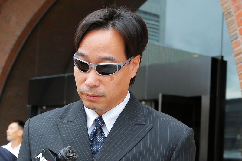 FILE PHOTO: Glenn Adam Chin leaves the federal courthouse in