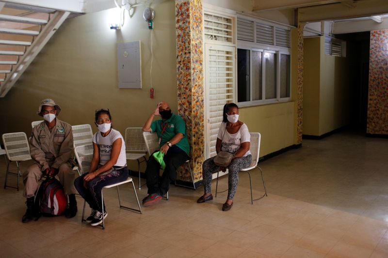 People wait to receive a dose of Cuba’s Abdala vaccine