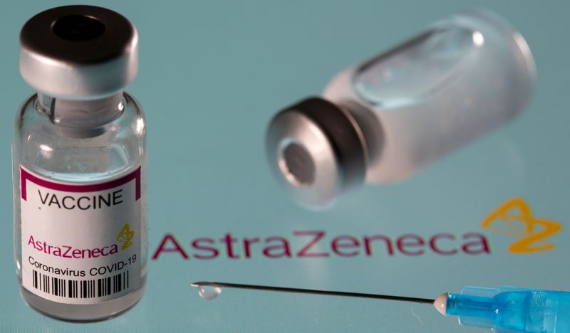 FILE PHOTO: Vial labelled “AstraZeneca coronavirus disease (COVID-19) vaccine” placed