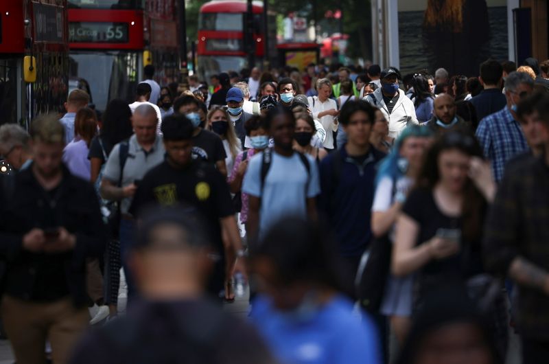 People walk along Oxford Street, amid the coronavirus disease (COVID-19)