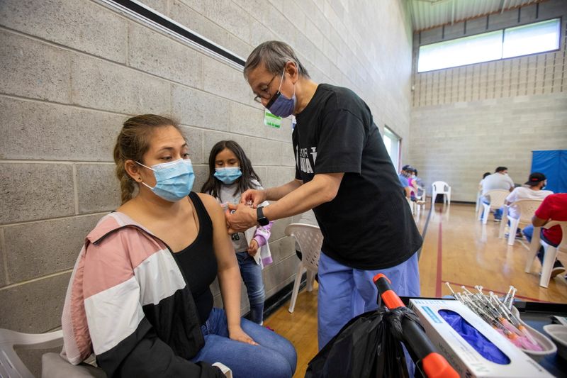 The Latino community organizes a vaccine clinic for their community