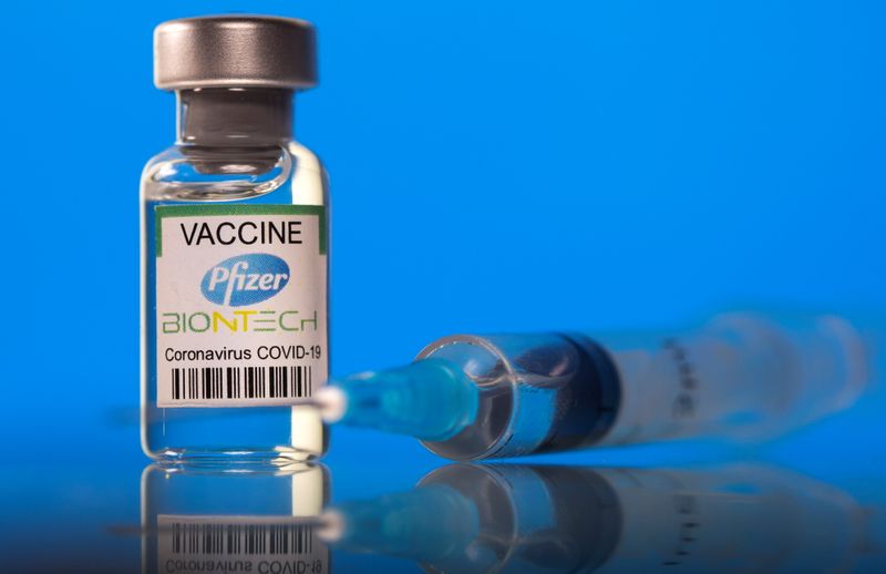 Picture illustration of a vial labelled with the Pfizer-BioNTech coronavirus