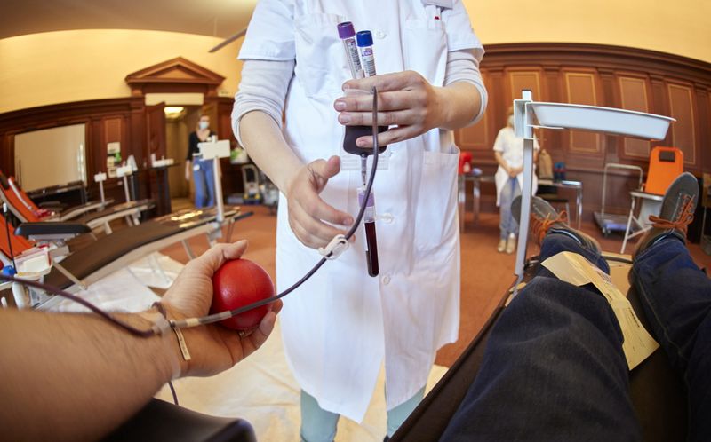 FILE PHOTO: A nurse collects samples at a blood donation