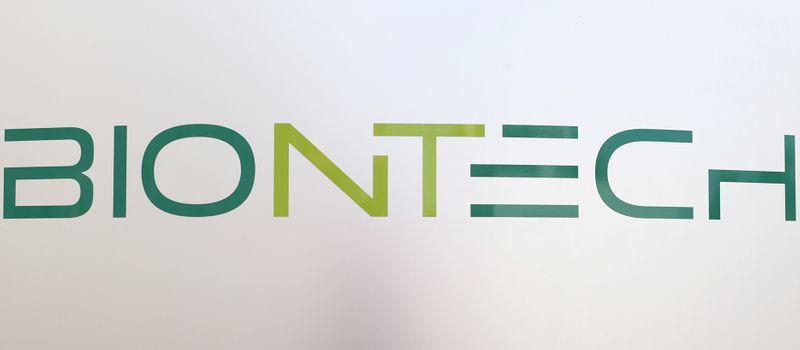 hThe new logo of German biotech firm BioNTech is seen