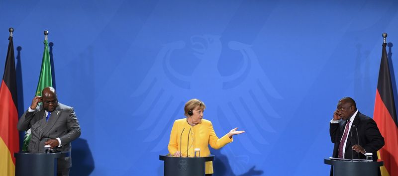 German Chancellor Angela Merkel addresses a press conference after the