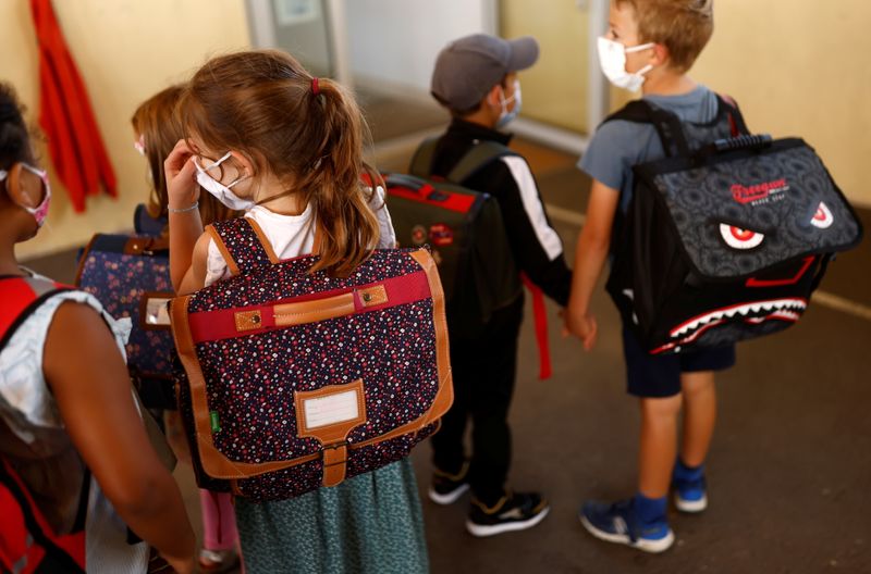 French children and teenagers head back to school after summer