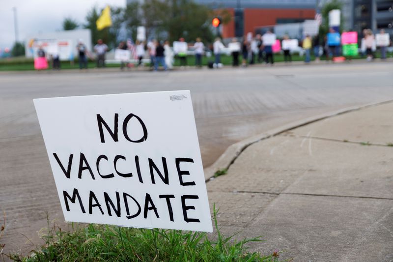 FILE PHOTO: People protest vaccine mandates at Summa Health Hospital