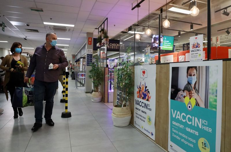 FILE PHOTO: Lagging behind in vaccinations, Brussels begins jabbing shoppers