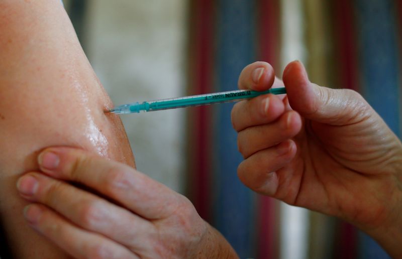 FILE PHOTO: COVID-19 Vaccination of patients at their homes in