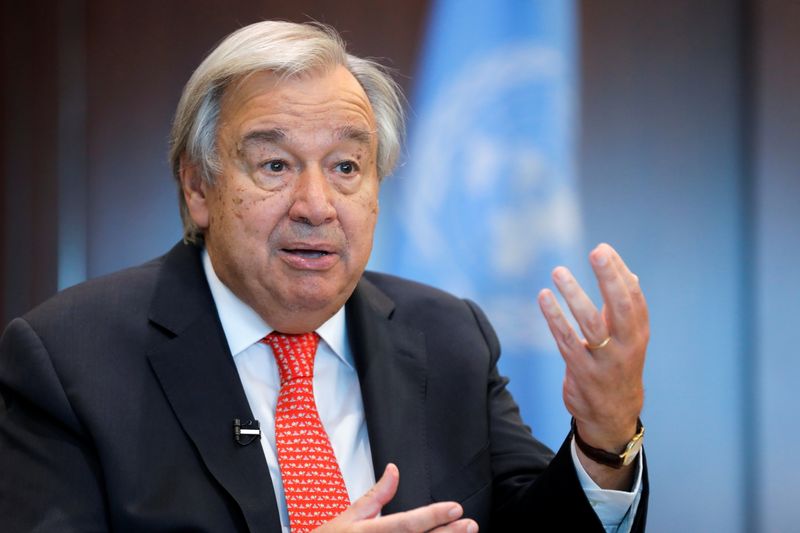 United Nations Secretary-General Antonio Guterres gestures during an interview with