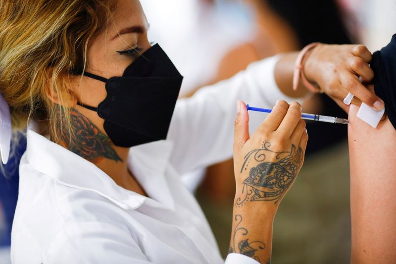 FILE PHOTO: Coronavirus disease (COVID-19) vaccination in Ciudad Juarez