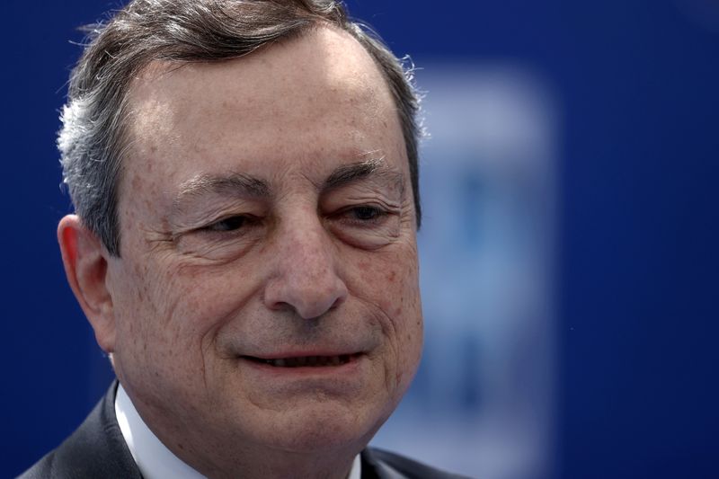 FILE PHOTO: Italian Prime Minister Mario Draghi arrives for a
