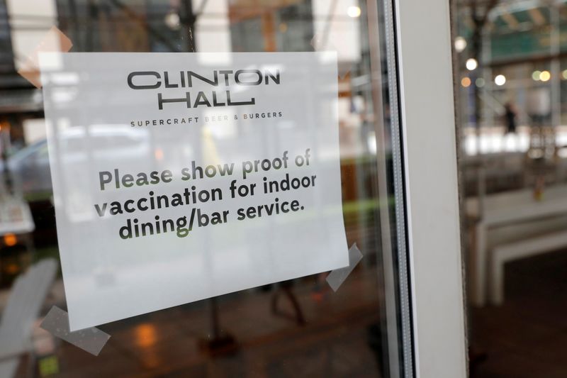 FILE PHOTO: Signage is seen on a window in a