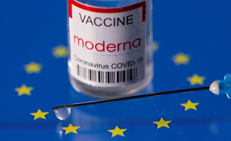 FILE PHOTO: Vial labelled “Moderna coronavirus disease (COVID-19) vaccine” placed