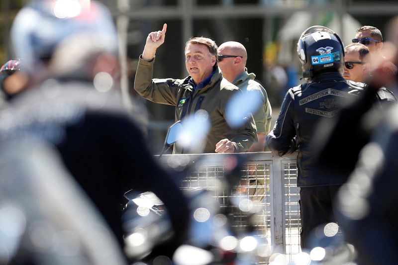 FILE PHOTO: Brazil’s President Bolsonaro leads a motorcade rally, in