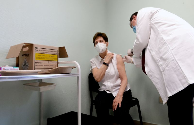 FILE PHOTO: Healthcare worker Kertesz receives Pfizer-BioNTech COVID-19 vaccine in